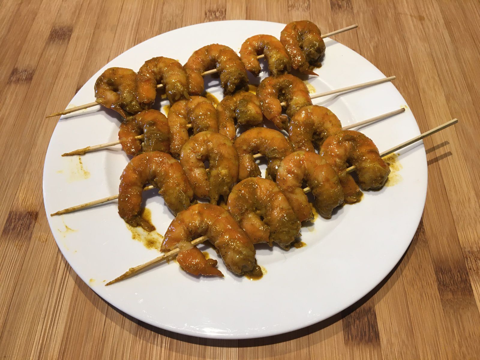 Crevettes sautées au curry, gingembre, sauce soja et sésame