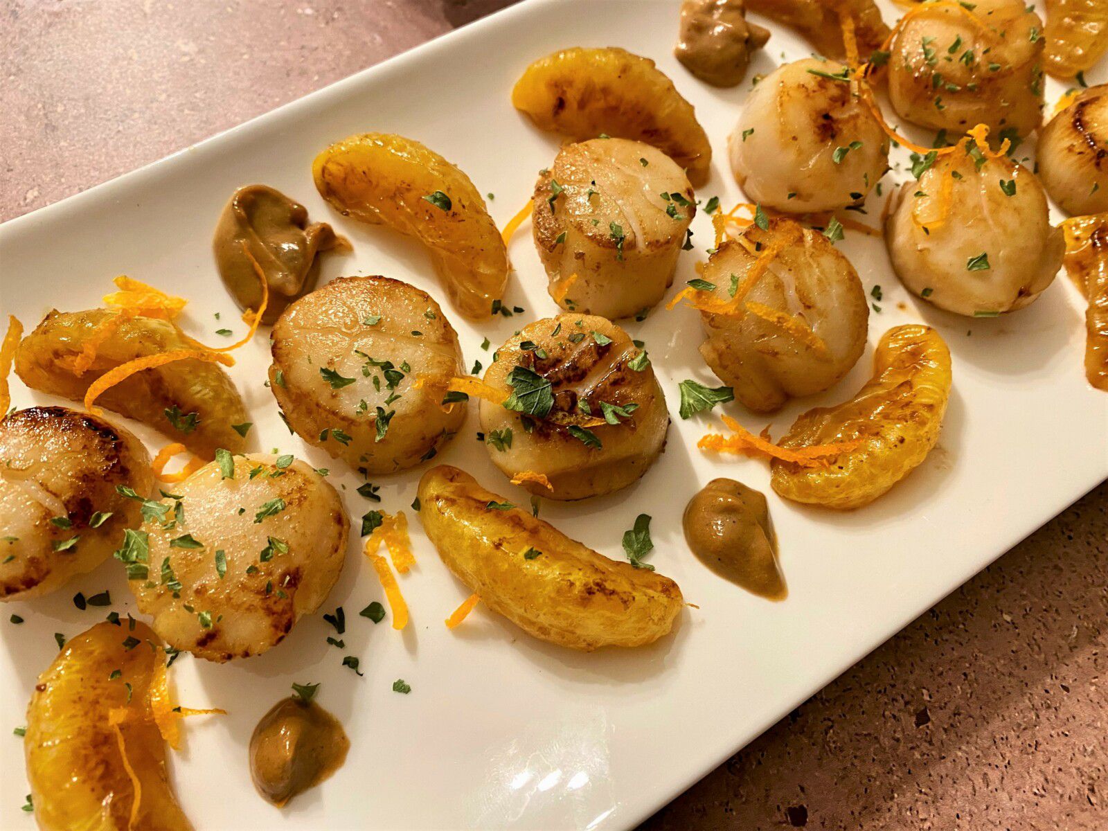  Saint-Jacques poêlées aux clémentines rôties