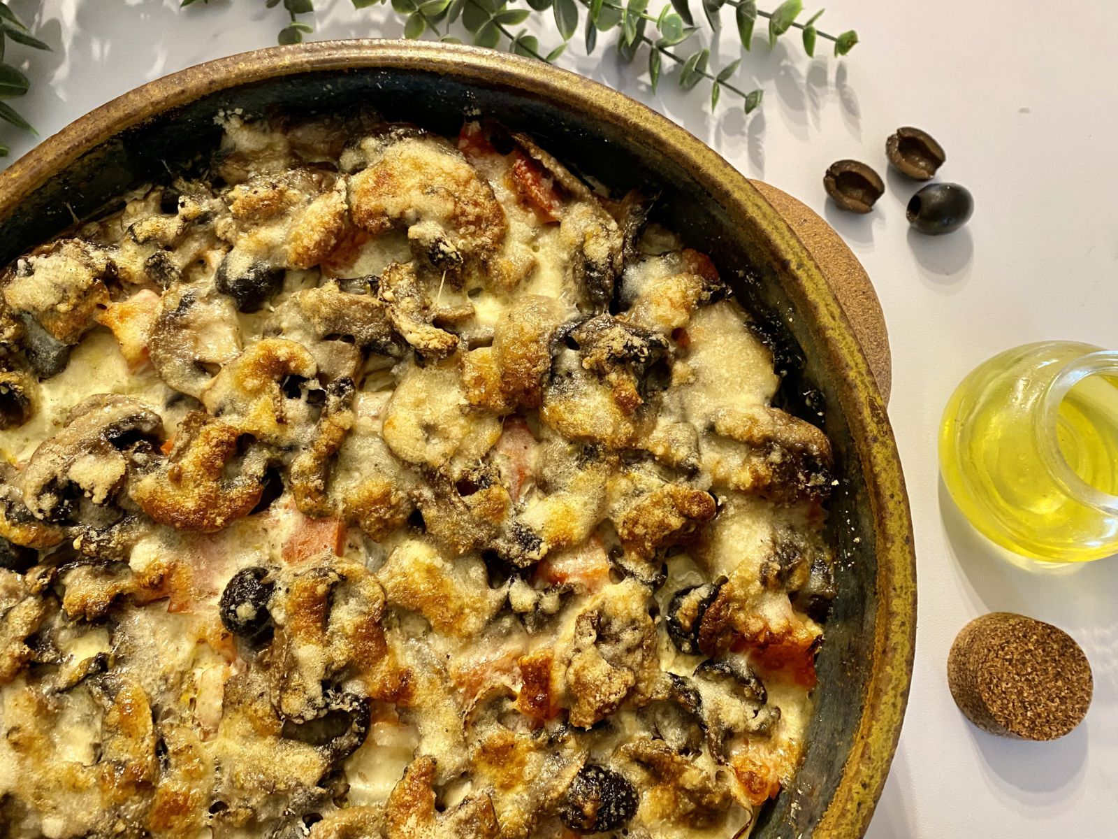 Gratin de fenouil aux champignons et aux olives
