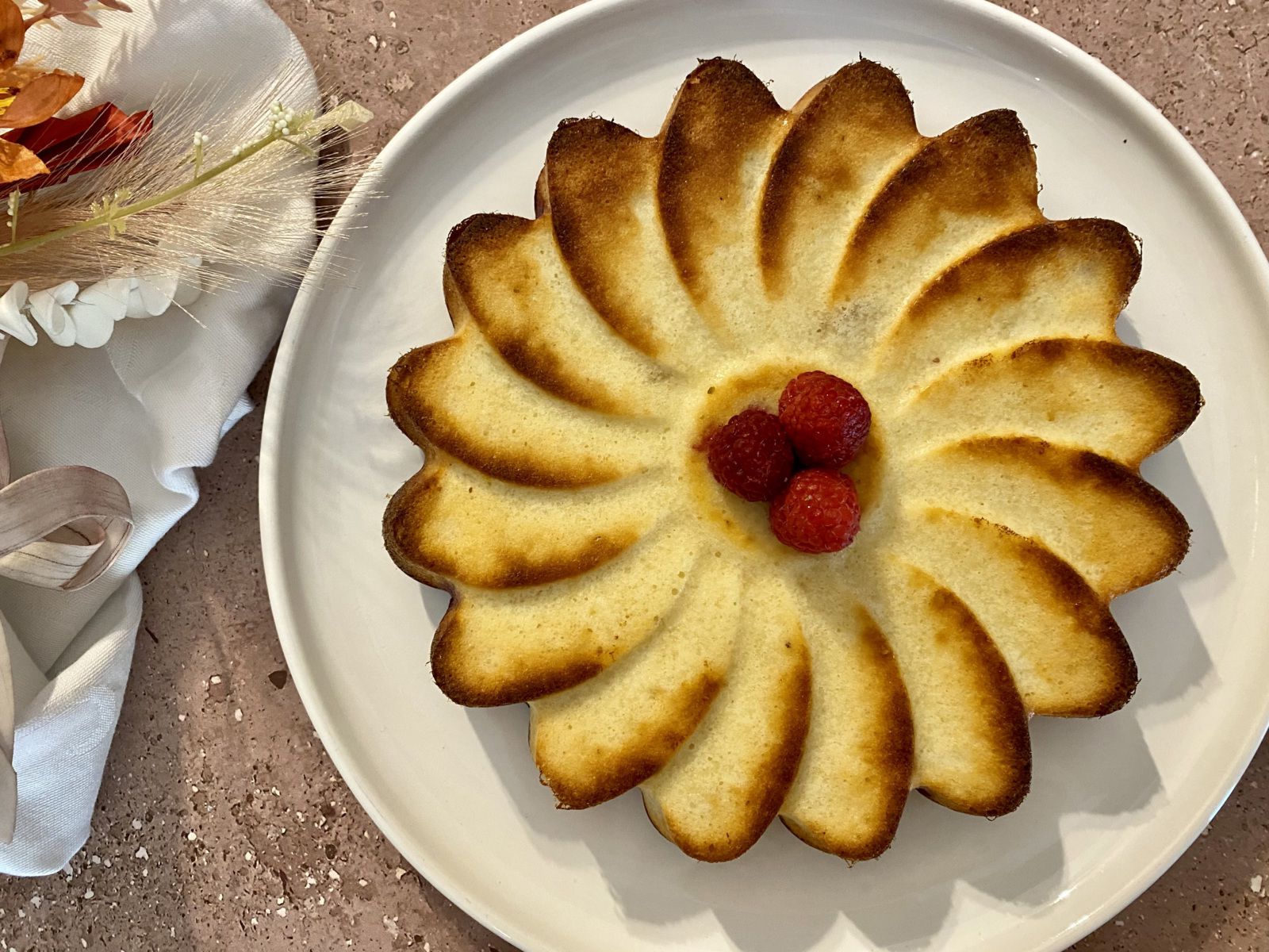 Fondant à la ricotta, amandes et framboises