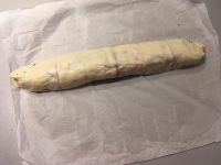 Pizza roulée au jambon, mozzarella et origan